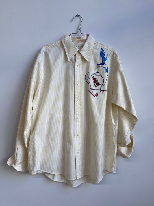 Hummingbird and a tea pot