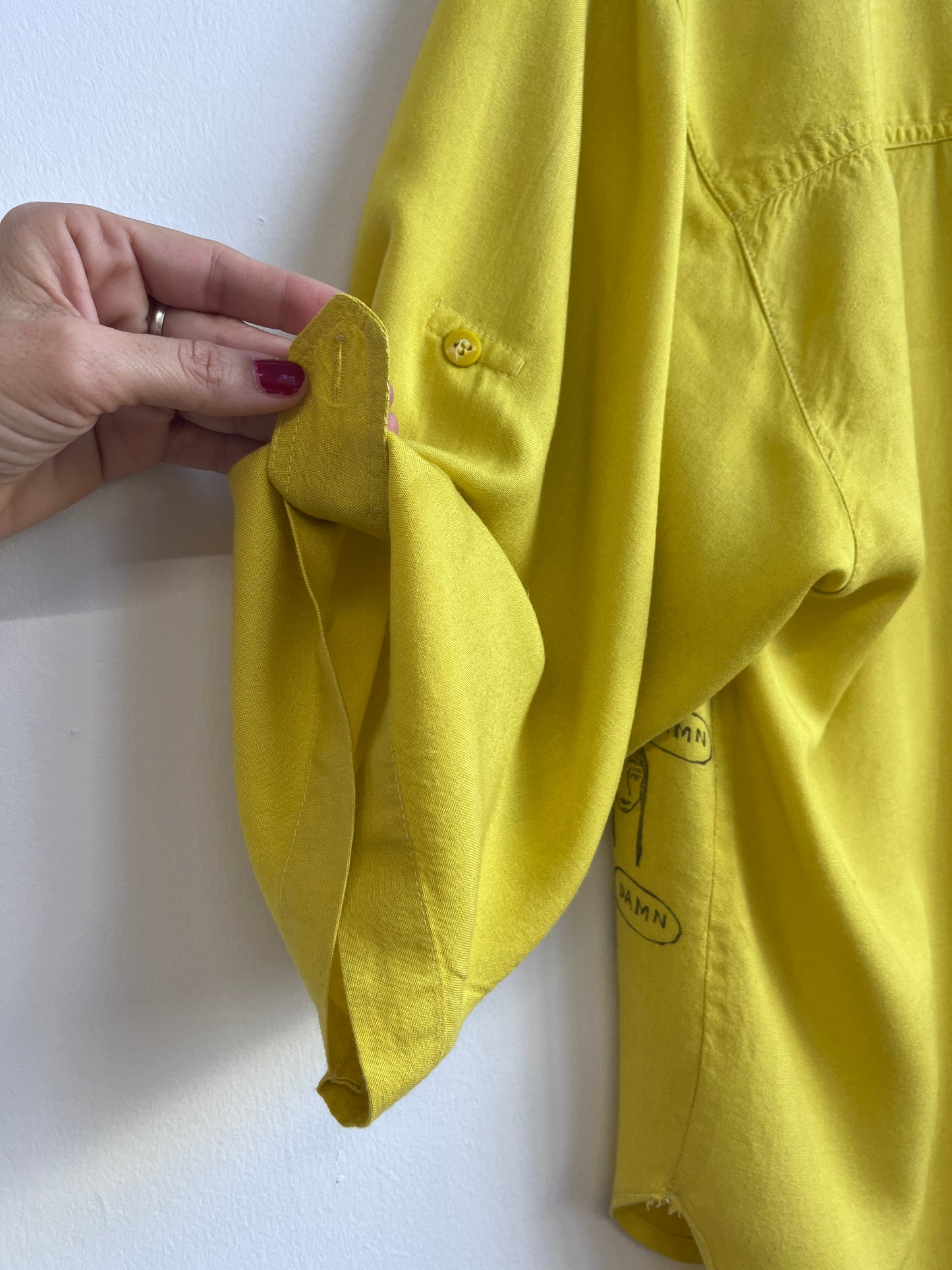 Obnoxious yellow shirt with damn girl print