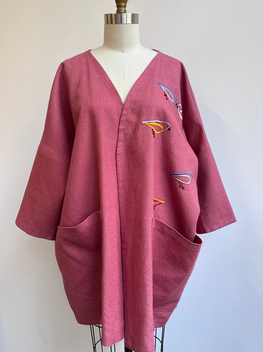 Imaginary Birds embroidered on a Mauve Linen Coat