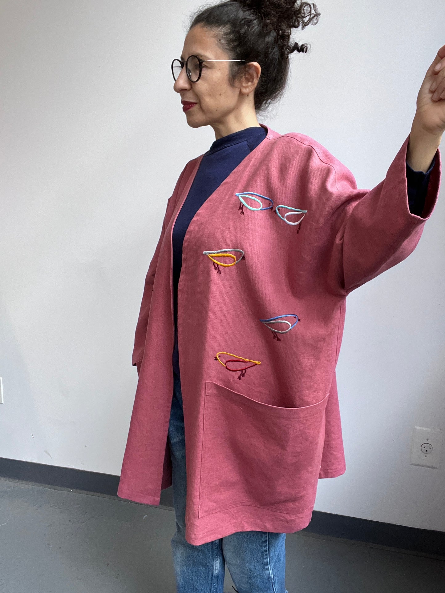 Imaginary Birds embroidered on a Mauve Linen Coat