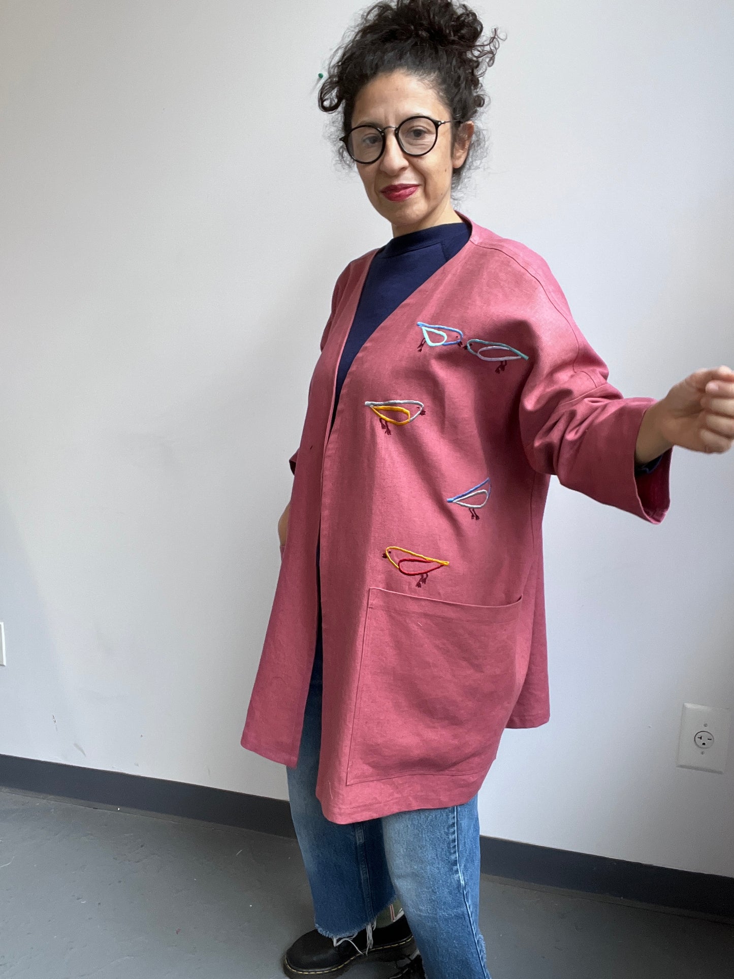 Imaginary Birds embroidered on a Mauve Linen Coat