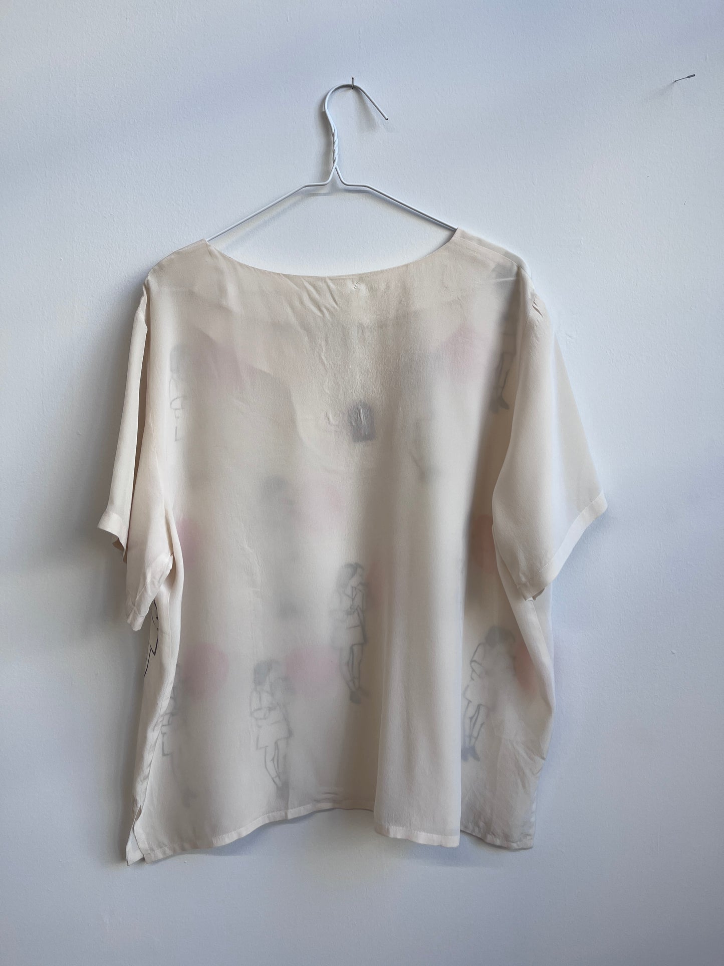 Blowing a Balloon printed on a silk top
