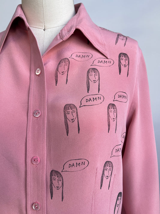 Damn Girl on a pink Blouse