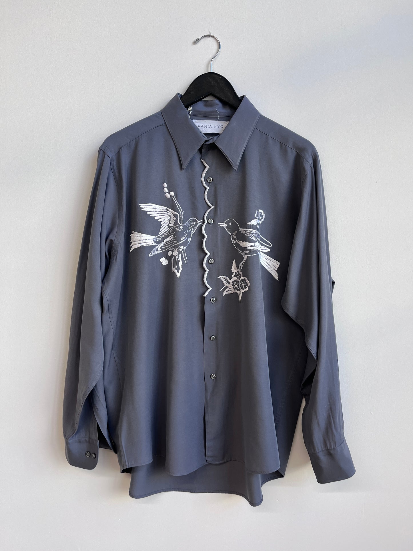 White birds and a scalloped center Gray Shirt