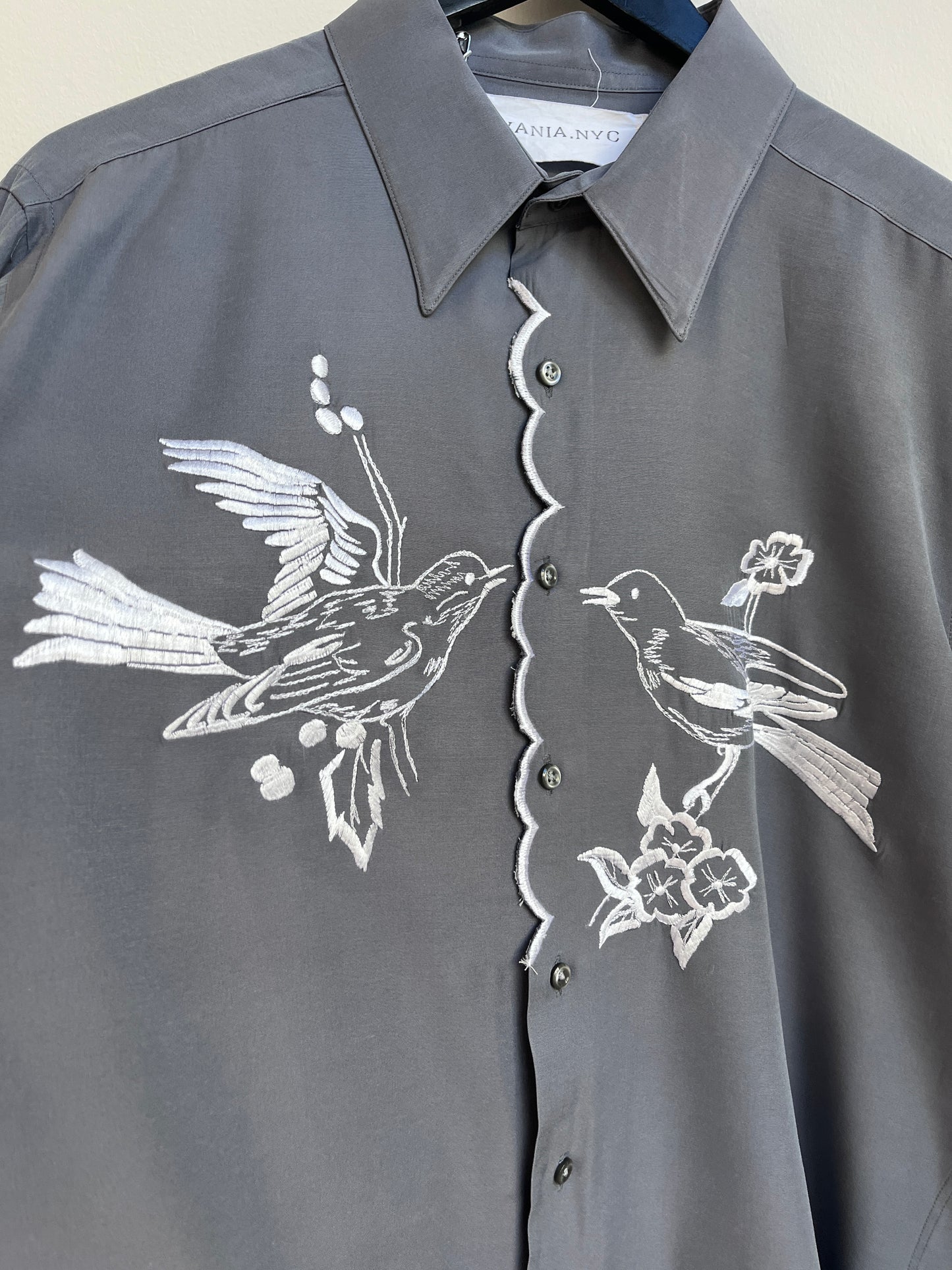 White birds and a scalloped center Gray Shirt