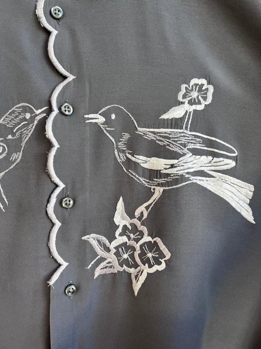 White birds and a scalloped center Gray Shirt