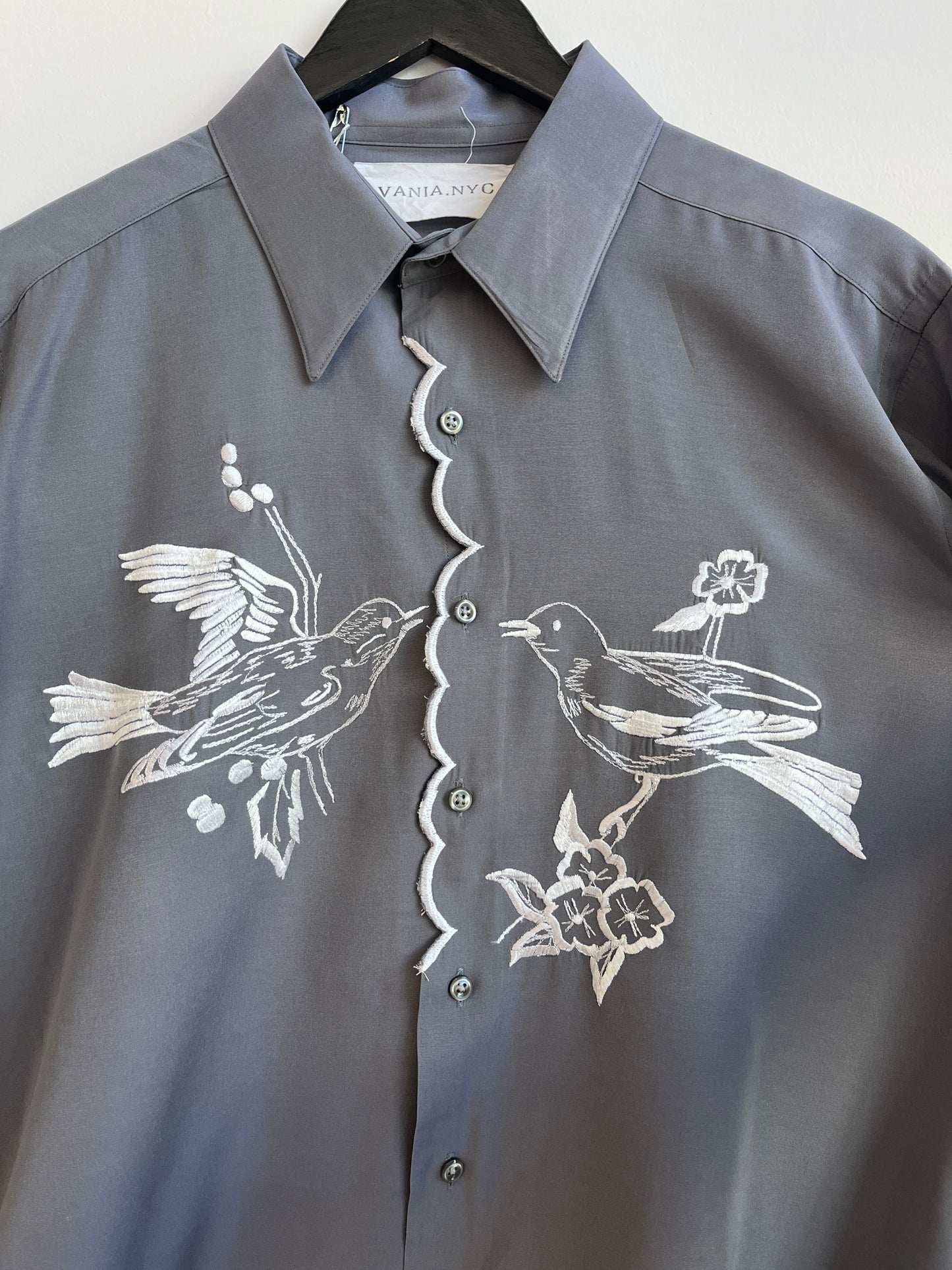 White birds and a scalloped center Gray Shirt