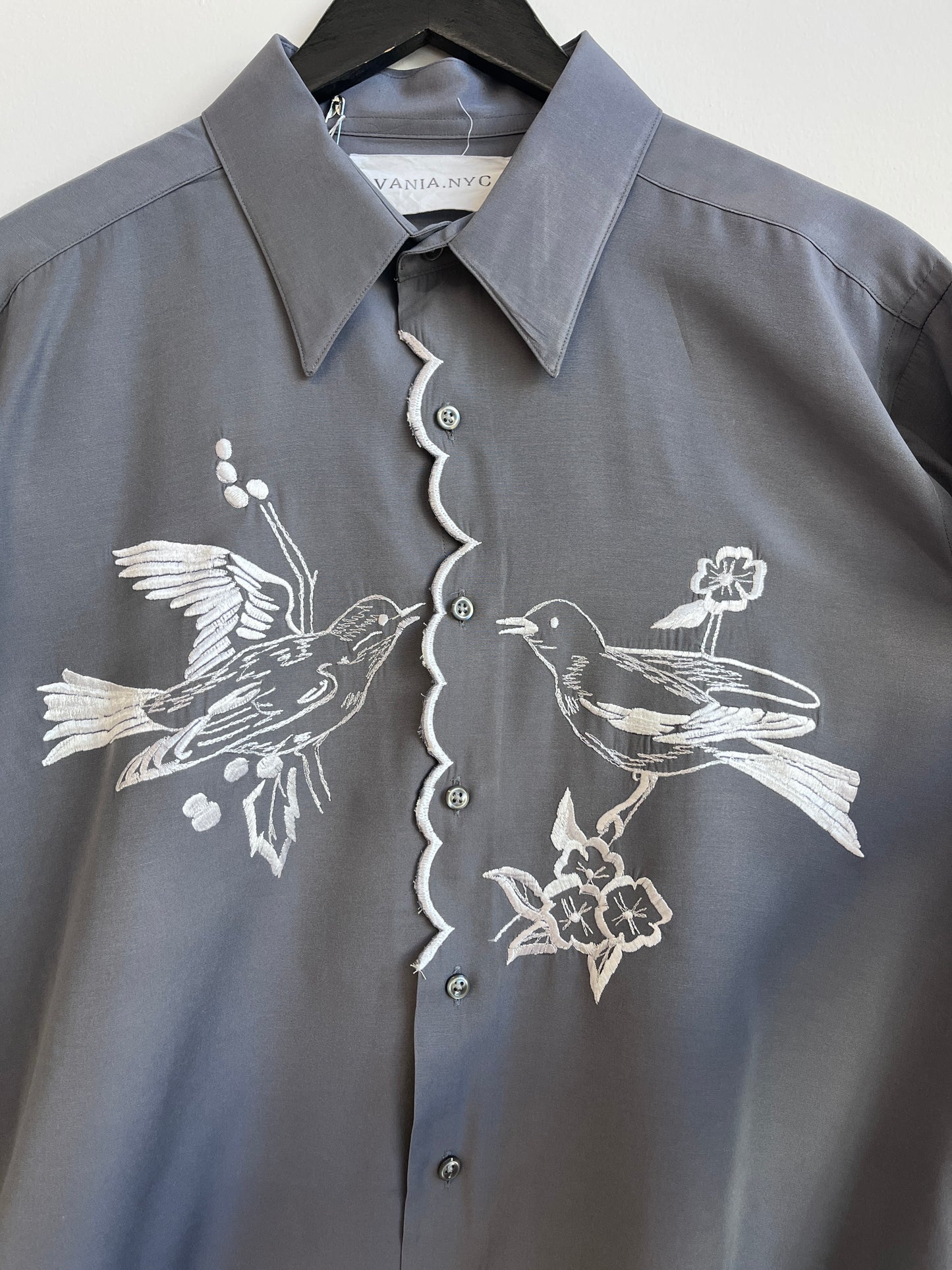 White birds and a scalloped center Gray Shirt
