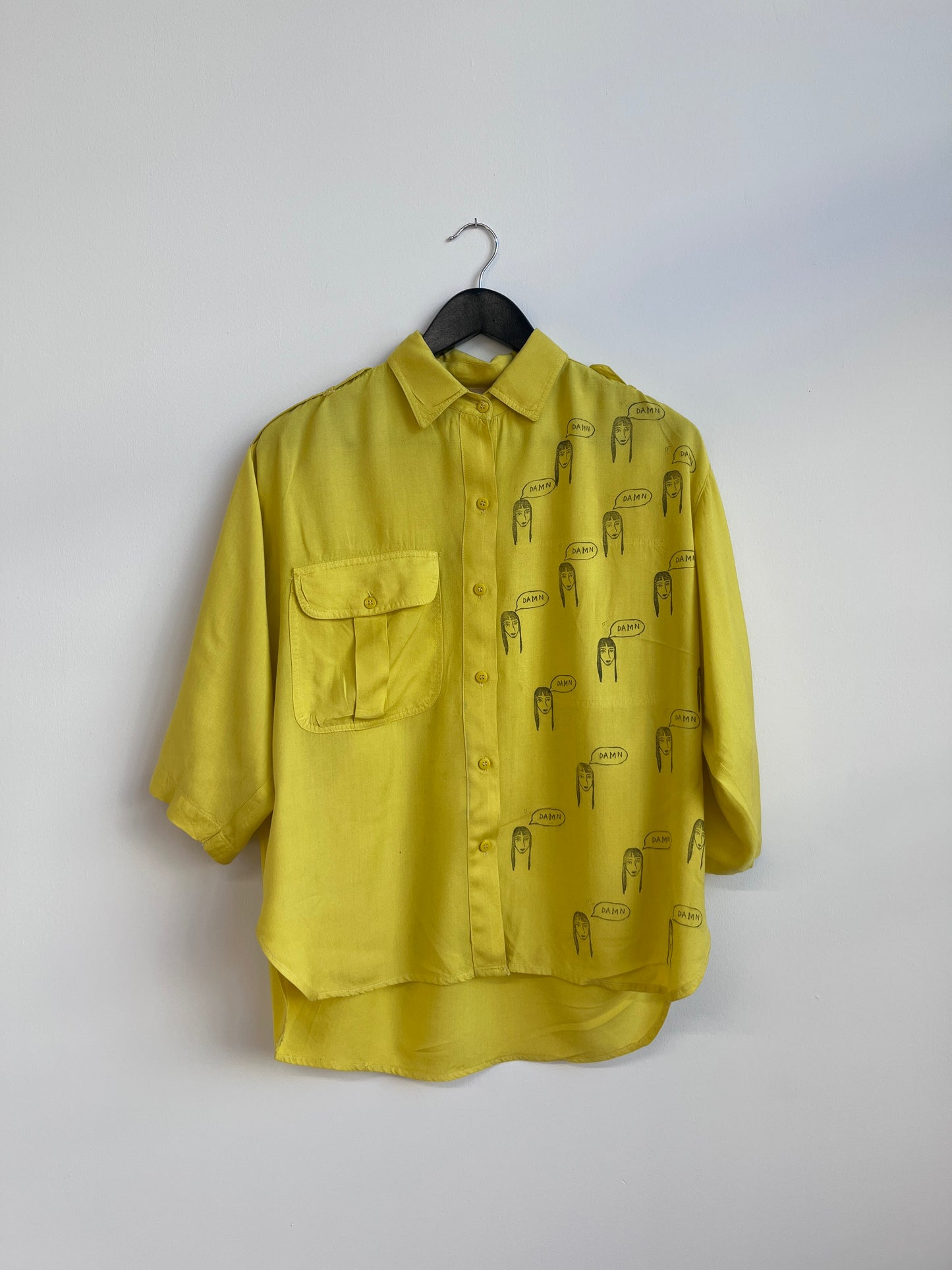 Obnoxious yellow shirt with damn girl print