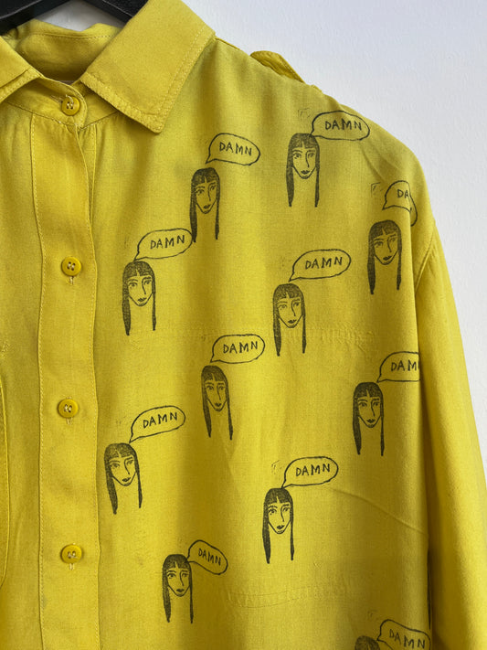 Obnoxious yellow shirt with damn girl print