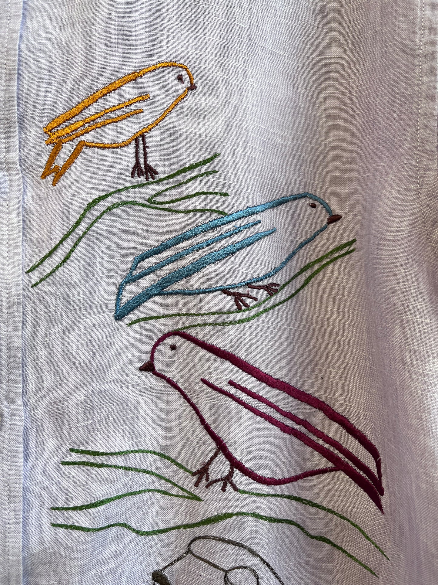 Love birds on a lavender linen shirt