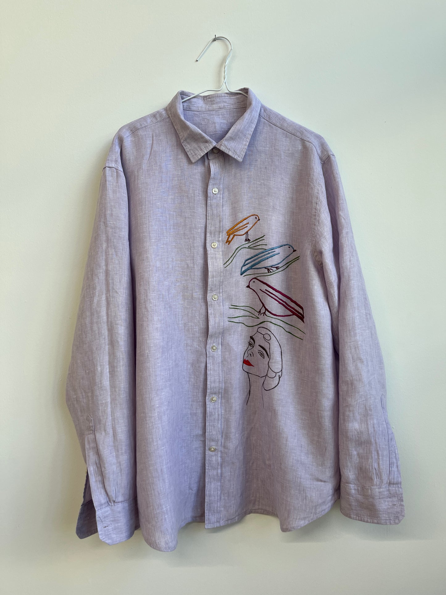 Love birds on a lavender linen shirt