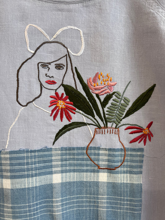 The table cloth blue shirt