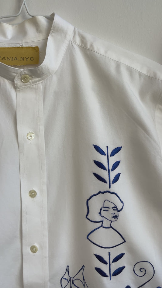 Her Universe in Blue embroidered on a white shirt